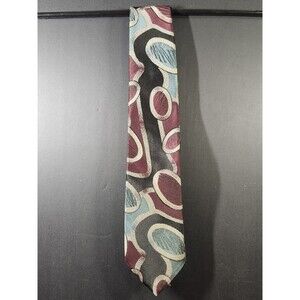 DiMaro Elegante tie features a bold, abstract geometric pattern in maroon, teal,
